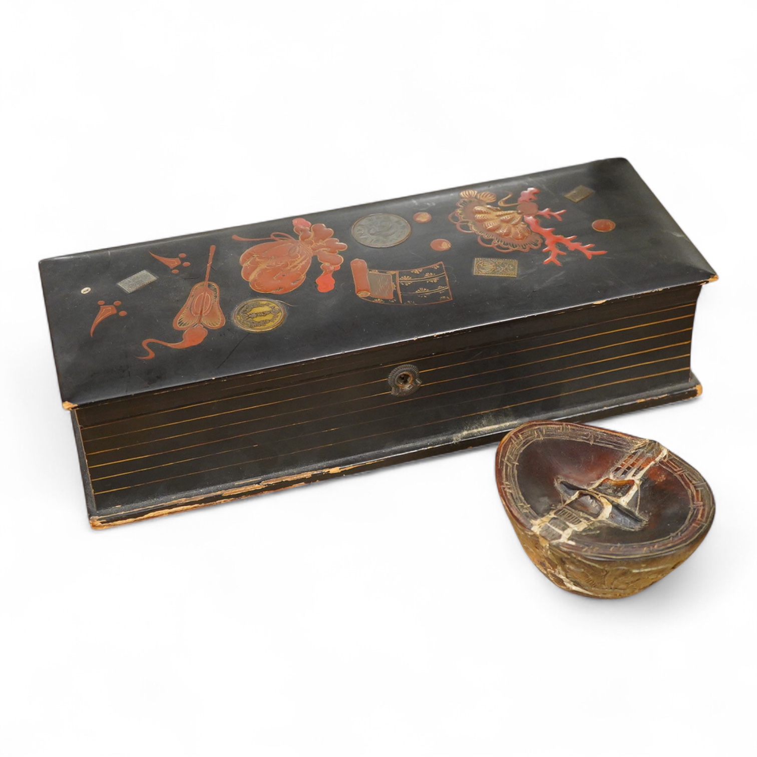 A Japanese lacquer box and a horn carving, box 30cm wide